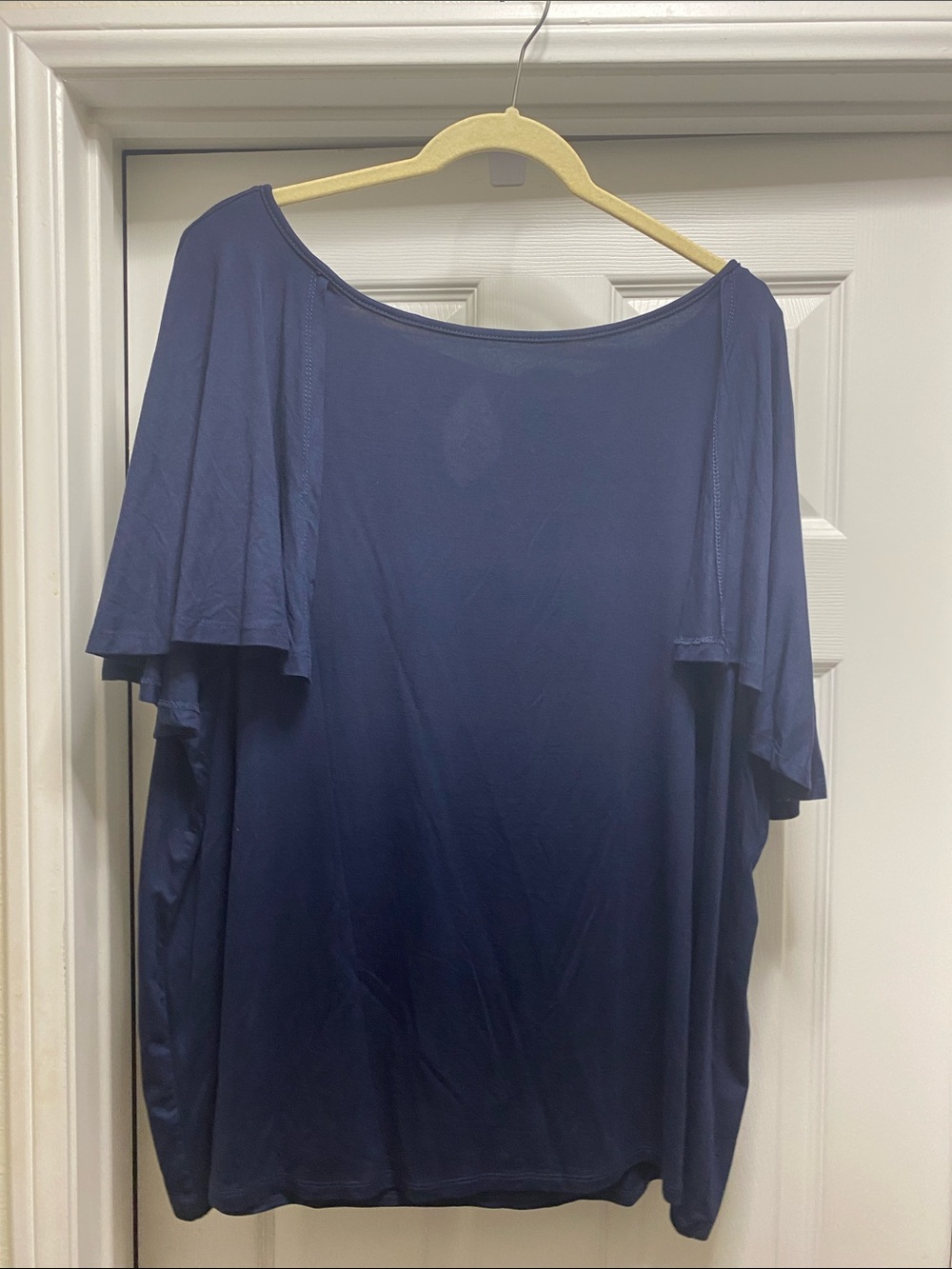 IMAN Navy Flutter Sleeve Top